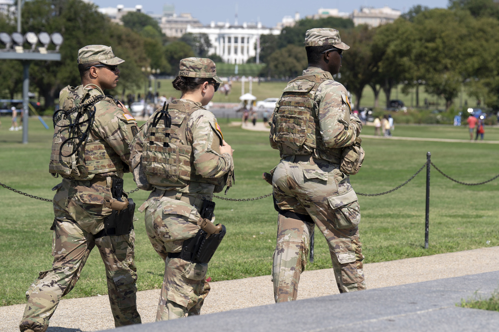 Members of the Ohio National Guard patrol the National Mall, Sunday, Sept. 14, 2025, in Washington. (AP Photo/Jose Luis Magana)