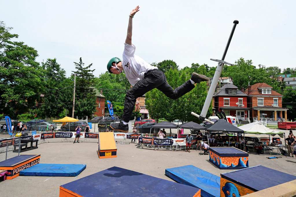 Extreme pogo athlete Duncan Murray of Ottawa, Canada, bails out of a trick during the Big Air competition at Pogopalooza 2026 in Wilkinsburg, Pa., Sunday, June 14, 2026. (AP Photo/Gene J. Puskar)