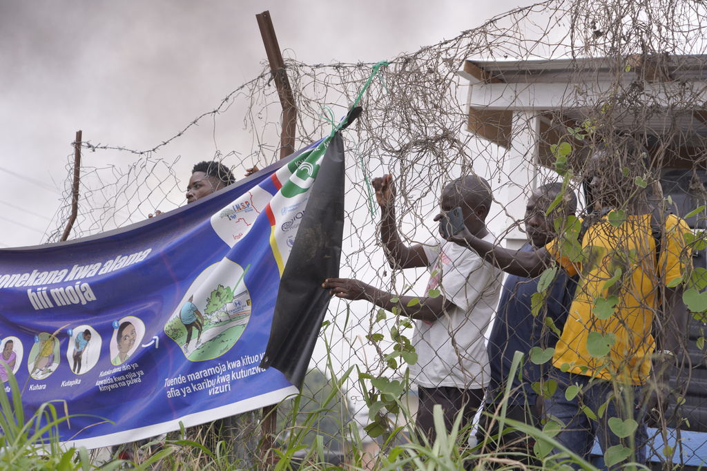 Workers at an Ebola treatment center go on strike over unpaid salaries and bonuses at Rwampara General Hospital, in Ituri, northeastern Congo, Monday, July 13, 2026, (AP Photo/Dirole Lotsima Dieudonne)