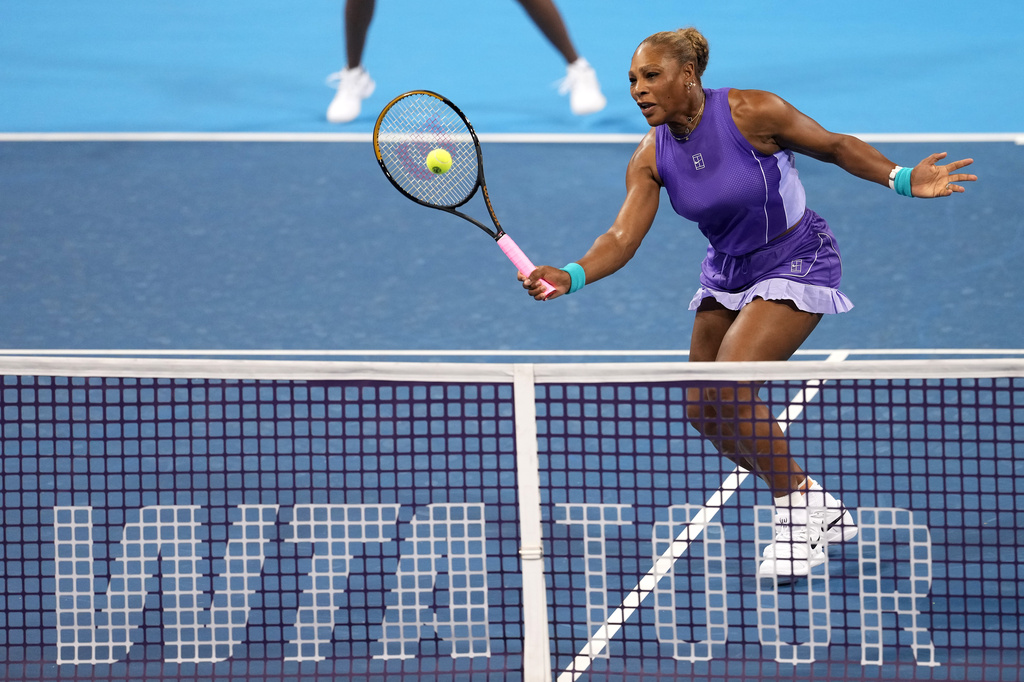 Serena Williams, of the United States, returns a shot against Marta Kostyuk, of Ukraine, and Peyton Stearns, also of the United States, during a women's doubles match at the Cincinnati Open tennis tournament, Monday, Aug. 17, 2026, in Mason, Ohio. (AP Photo/Kareem Elgazzar)