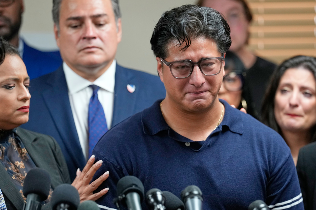 Ronaldo Salgado, son of Lorenzo Salgado Araujo, speaks during a news conference Wednesday, July 8, 2026, in Houston. (AP Photo/David J. Phillip)