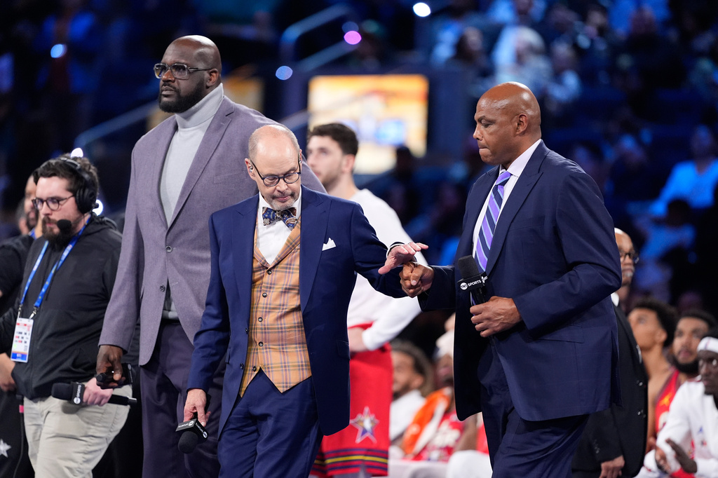 FILE - Shaquille O'Neal, Ernie Johnson and Charles Barkley stand at mid-court to be honored during the NBA All-Star basketball game Sunday, Feb. 16, 2025, in San Francisco. (AP Photo/Godofredo A. Vásquez,File)