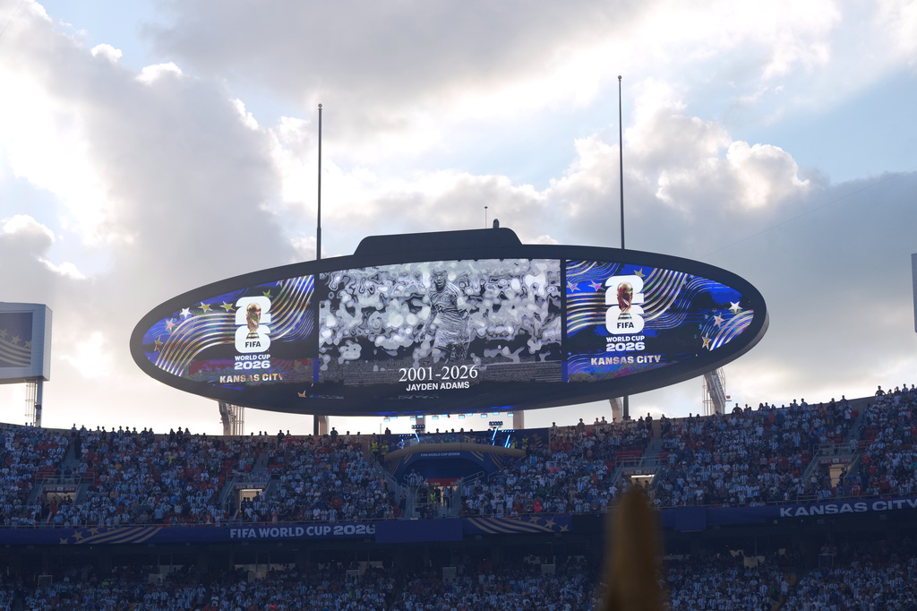 A moment of silence is held in memory of South Africa player Jayden Adams prior to the World Cup quarterfinal soccer match between Argentina and Switzerland in Kansas City, Mo., Saturday, July 11, 2026. (AP Photo/Abbie Parr)