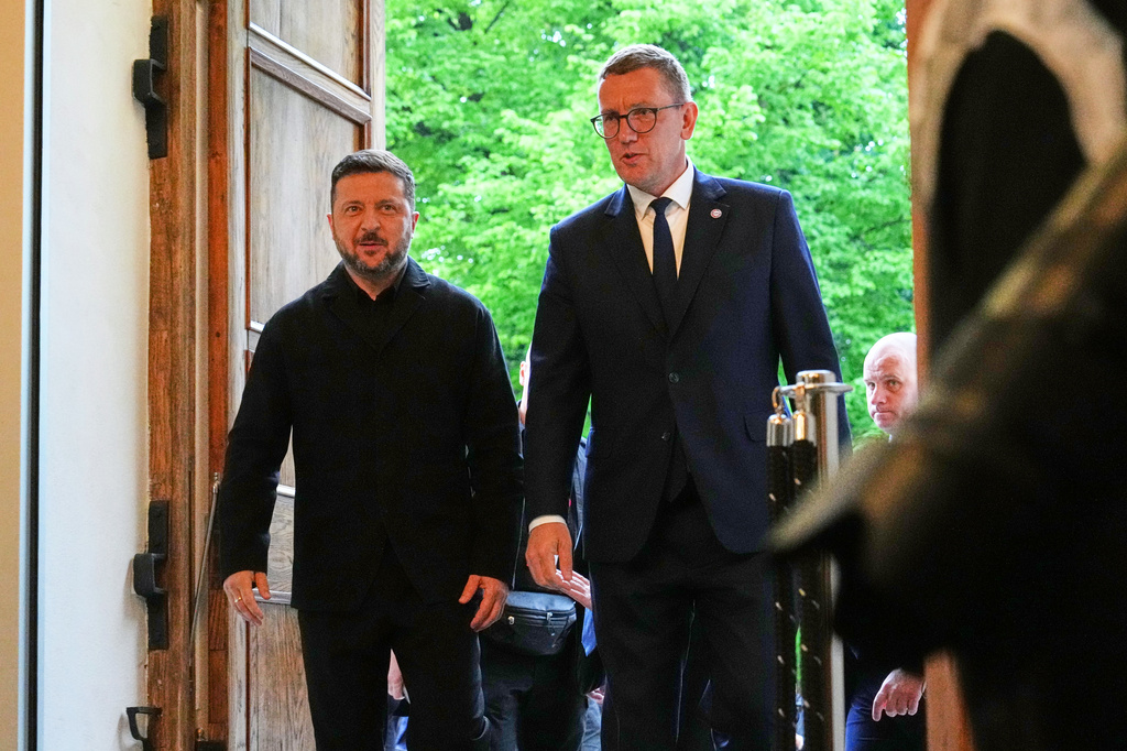 Estonia's Prime Minister Kristen Michal, right, and Ukraine's President Volodymyr Zelenskyy attend a Nordic and Baltic countries meeting in Tallinn, Estonia, Tuesday, June 9, 2026. (AP Photo/Sergei Grits)