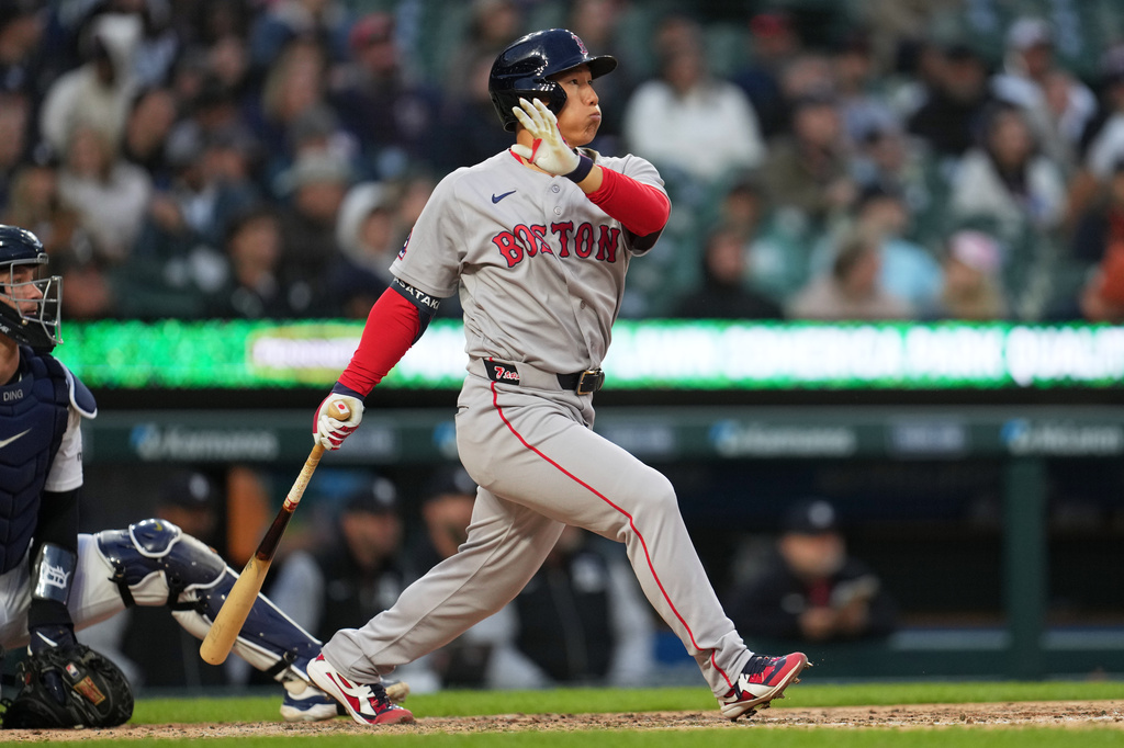 Boston Red Sox's Masataka Yoshida hits a single against the Detroit Tigers during the sixth inning of a baseball game Wednesday, May 6, 2026, in Detroit. (AP Photo/Paul Sancya)
