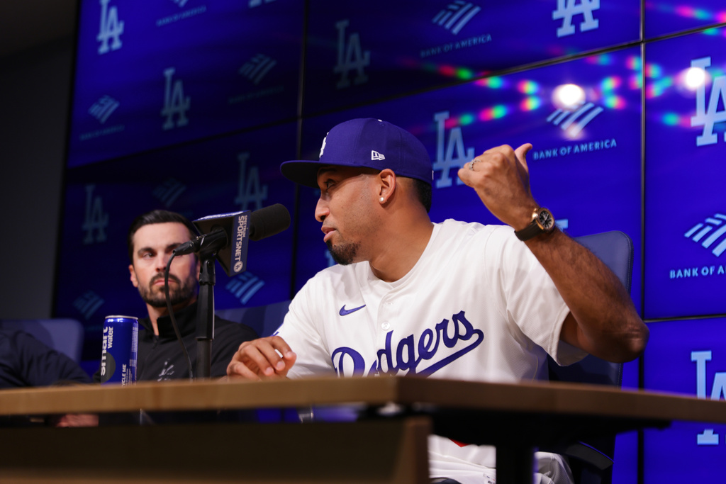 Edwin Díaz speaks during his introduction as a new member of the Los Angeles Dodgers baseball team Friday, Dec. 12, 2025, in Los Angeles. (AP Photo/Ethan Swope)