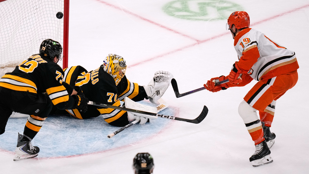 Anaheim Ducks right wing Troy Terry (19) scores on Boston Bruins goaltender Joonas Korpisalo (70), breaking a 3-3 tie, during the third period of an NHL hockey game, Thursday, Oct. 23, 2025, in Boston. (AP Photo/Charles Krupa)