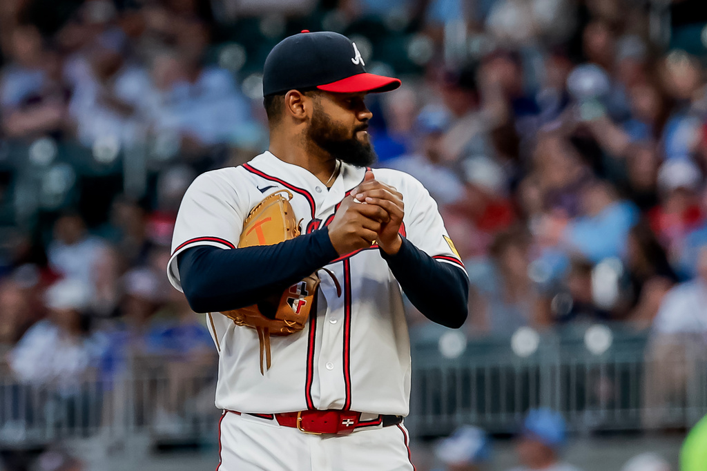 Atlanta Braves pitcher Reynaldo López rubs up a new ball after giving up a solo home run to Tampa Bay Rays' Victor Mesa Jr. during the second inning of a baseball game, Wednesday, Sept. 9, 2026, in Atlanta. (AP Photo/Erik S. Lesser)