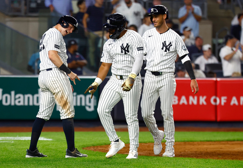 New York Yankees' Ben Rice, left and Heliot Ramos, right , celebrate after Ramos three-run home run during the eighth inning of a baseball game against theColorado Rockies , Tuesday, Sept. 8, 2026, in New York. (AP Photo/Noah K. Murray)