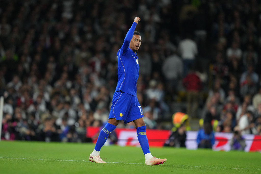 Chelsea's Morgan Rogers celebrates after scoring during the English Premier League soccer match between Fulham and Chelsea in London, Monday, Aug. 24, 2026. (AP Photo/Kirsty Wigglesworth)