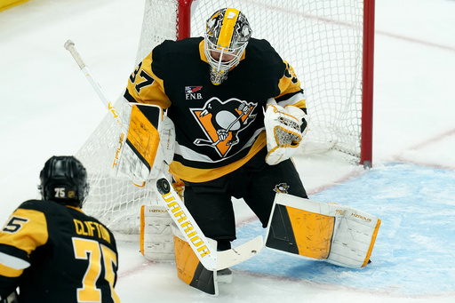 Pittsburgh Penguins goaltender Arturs Silovs makes a save during the first period of an NHL hockey game against the Columbus Blue Jackets, Saturday, Oct. 25, 2025, in Pittsburgh. (AP Photo/Matt Freed) Pittsburgh Penguins goaltender Arturs Silovs makes a save during the first period of an NHL hockey game against the Columbus Blue Jackets, Saturday, Oct. 25, 2025, in Pittsburgh. (AP Photo/Matt Freed)
