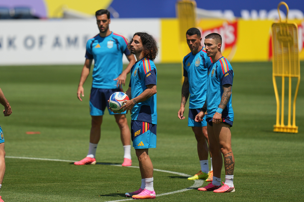Spain's Marc Cucurella, center, and teammates attend a training session ahead of a World Cup quarterfinal soccer match against Belgium in Carson, Calif., Thursday, July 9, 2026. (AP Photo/Andre Penner)