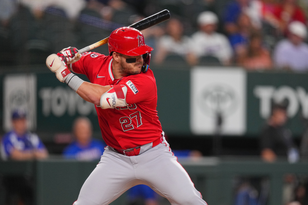 Los Angeles Angels designated hitter Mike Trout waits for a pitch from the Texas Rangers during the first inning of a baseball game, Wednesday, July 8, 2026, in Arlington, Texas. (AP Photo/Julio Cortez)