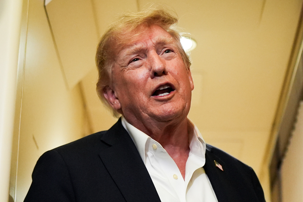 President Donald Trump speaks with reporters while in flight on Air Force One from Shannon, Ireland to Joint Base Andrews, Md., Sunday, Sept. 13, 2026. (AP Photo/Julia Demaree Nikhinson)