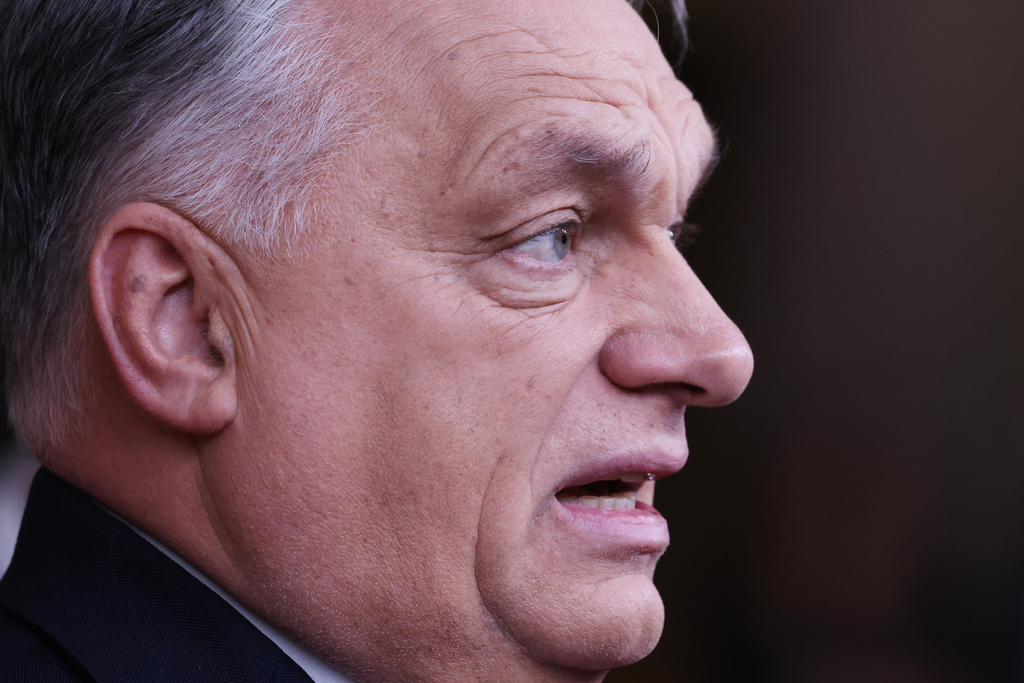 Hungary's Prime Minister Viktor Orban speaks with the media as he arrives for the EU Summit in Brussels, Thursday, Dec. 18, 2025. (AP Photo/Geert Vanden Wijngaert)