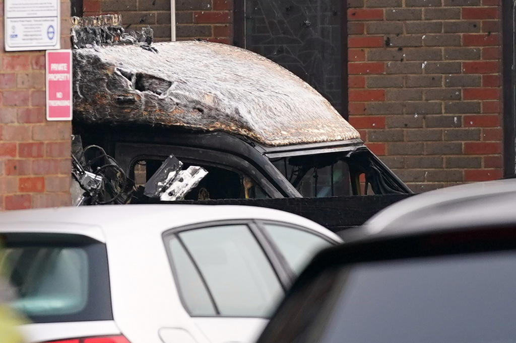 A burnt car is seen in Golders Green, London, Monday, March 23, 2026 after an apparent arson attack on four vehicles belonging to a Jewish ambulance service, Hatzola Northwest, in London.(AP Photo/Alberto Pezzali)