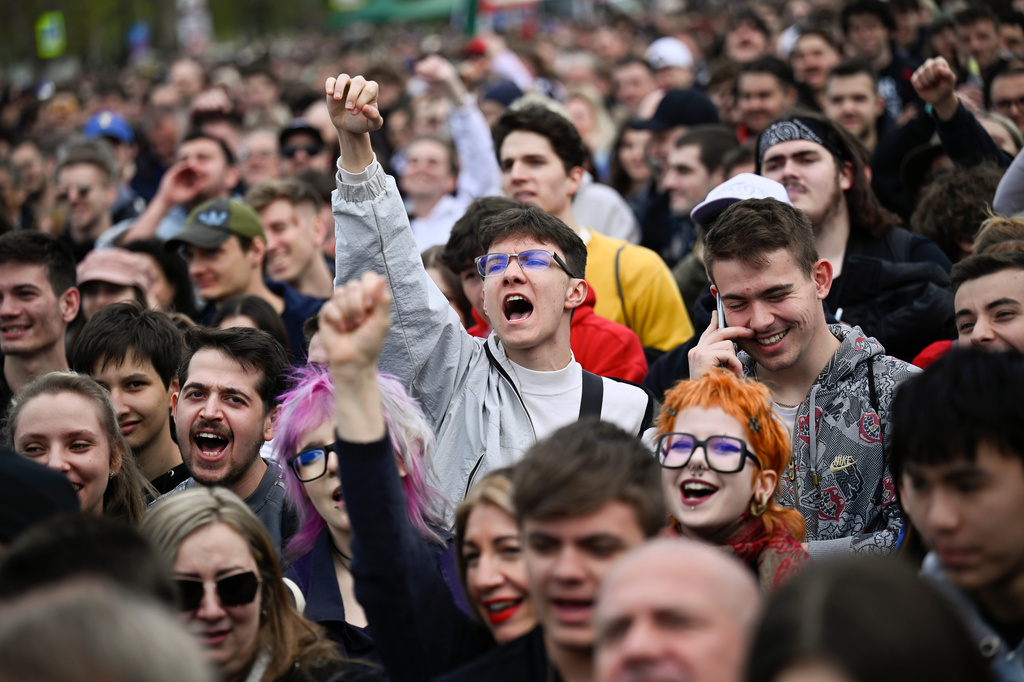 People react during an anti-government concert featuring dozens of the country's most popular performers in Budapest, Hungary, Friday, April 10, 2026. (AP Photo/Denes Erdos)