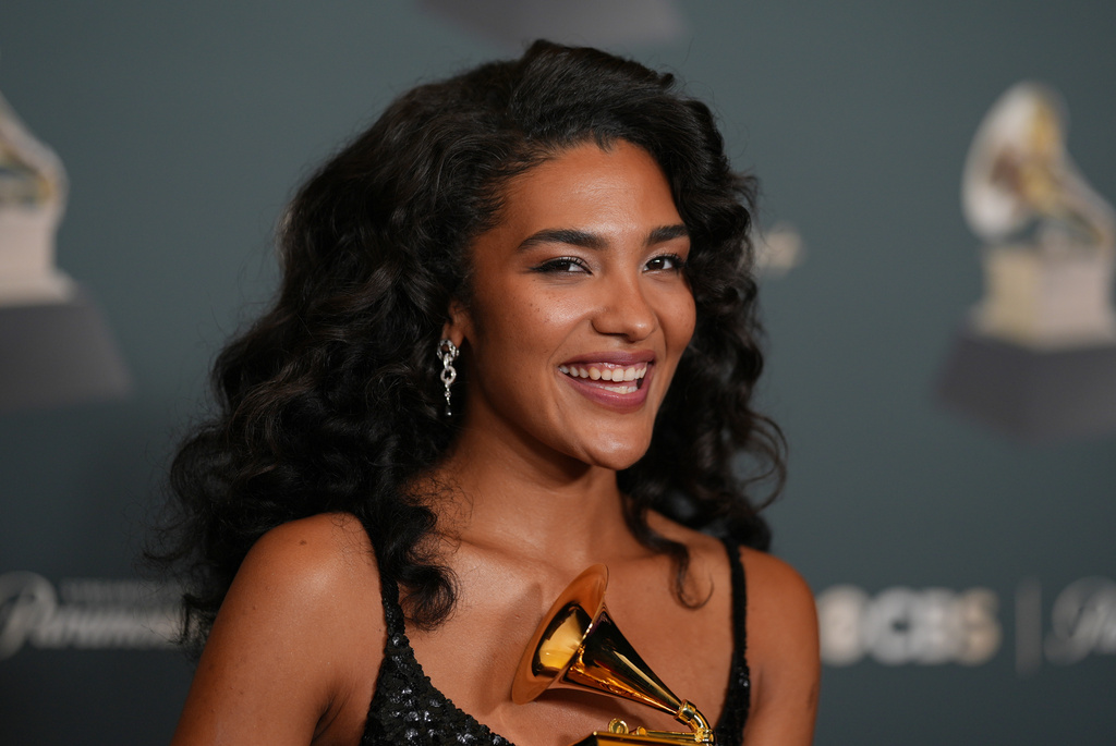 Olivia Dean poses in the press room with the award for best new artist during the 68th annual Grammy Awards on Sunday, Feb. 1, 2026, in Los Angeles. (Photo by Richard Shotwell/Invision/AP)