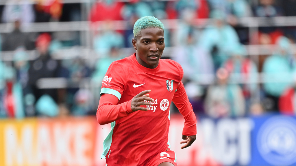 FILE - Kansas City Current forward Temwa Chawinga runs up field during an NWSL soccer match against the Portland Thorns FC in Kansas City, Mo., March 15, 2025. (AP Photo/Peter Aiken, File)