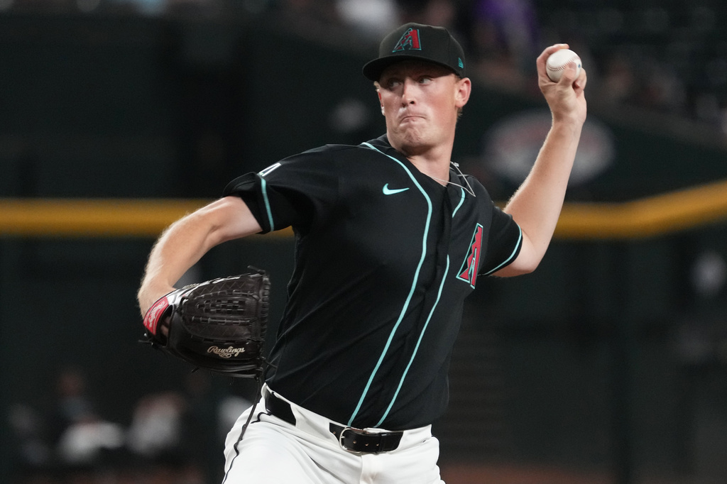 Arizona Diamondbacks pitcher Kohl Drake throws against the Athletics in the first inning of a baseball game, Tuesday, July 21, 2026, in Phoenix. (AP Photo/Rick Scuteri)