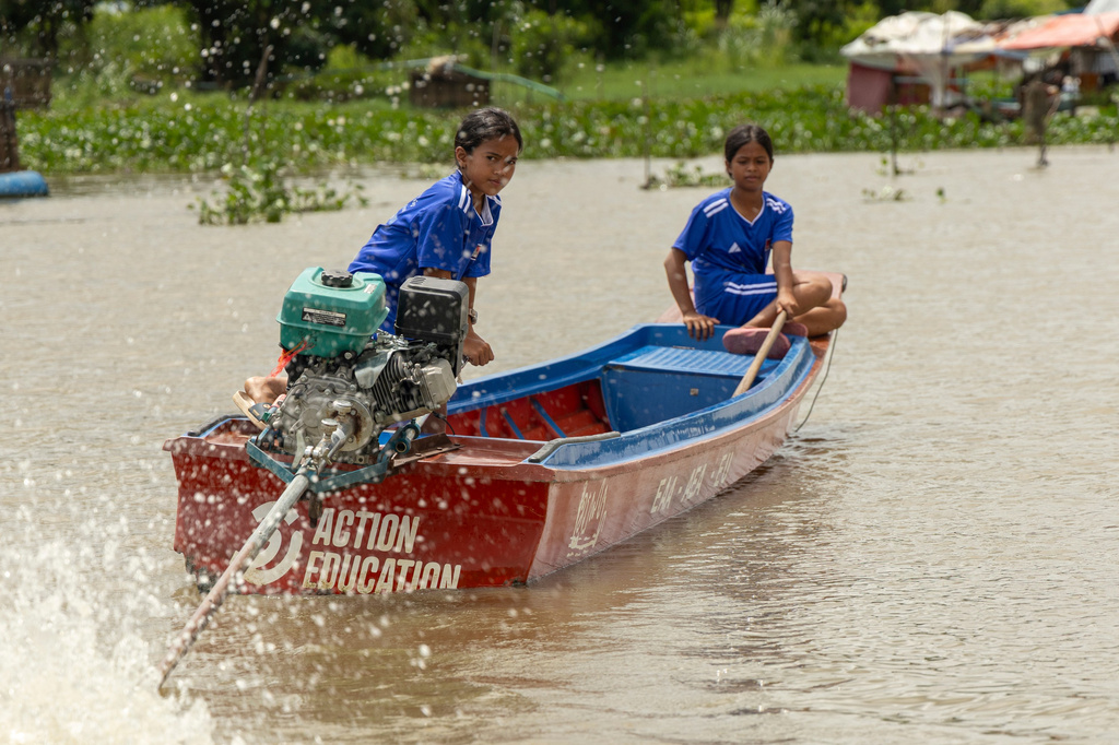 Students from a floating village on Cambodia's Tonle Sap Lake take a school boat back to their homes on Tuesday, June 30, 2026. (AP Photo/Anton L. Delgado)