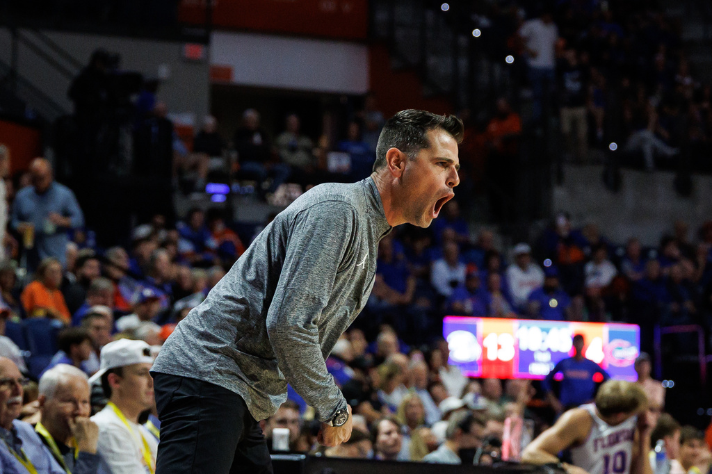 Florida Gators head coach Todd Golden shouts to his team during the first half of an NCAA college basketball game against Florida, Thursday, Nov. 6, 2025, in Gainesville, Fla. (AP Photo/Chris Watkins)