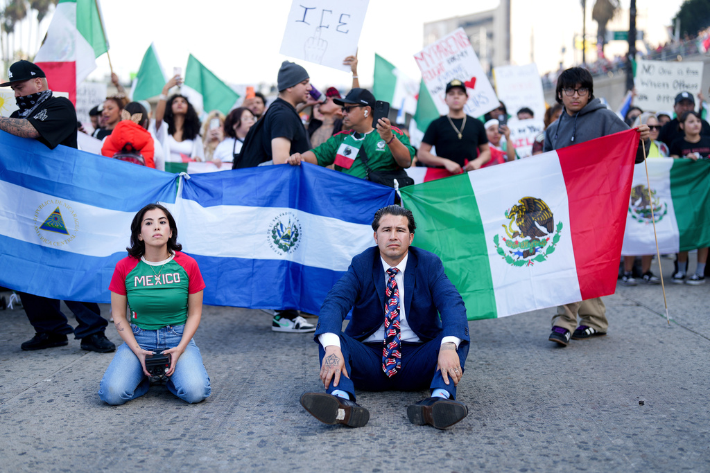EDS NOTE: OBSCENITY - Demonstrators shut down the 101 freeway during a protest calling for immigration reform, Feb. 2, 2025, in Los Angeles. (AP Photo/Eric Thayer, File)