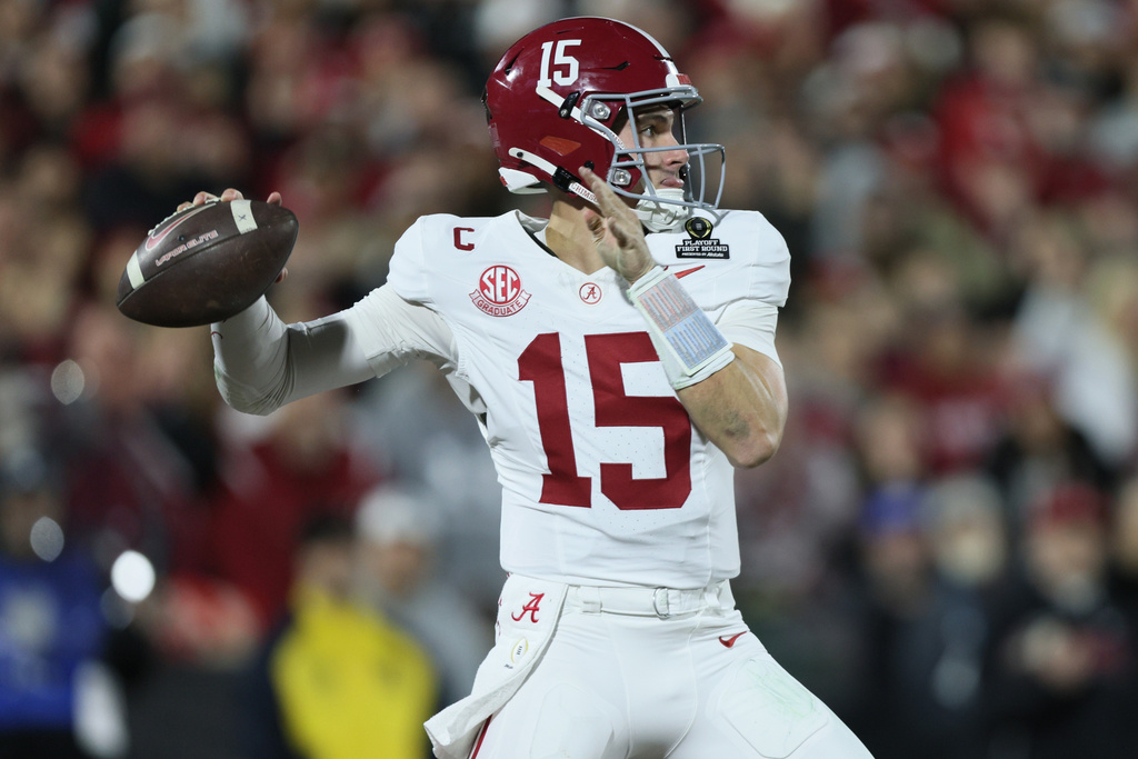 Alabama quarterback Ty Simpson (15) works in the pocket against Oklahoma during the first half in the first round of an NCAA College Football Playoff, Friday, Dec. 19, 2025, in Norman, Okla. (AP Photo/Nate Billings)