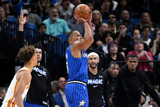 Orlando Magic guard Desmond Bane, right, looks to shoot a 3-point basket as Atlanta Hawks guard Dyson Daniels, left, looks on during the first half of an NBA basketball game, Friday, Oct. 24, 2025, in Orlando, Fla. (AP Photo/Phelan M. Ebenhack) Orlando Magic guard Desmond Bane, right, looks to shoot a 3-point basket as Atlanta Hawks guard Dyson Daniels, left, looks on during the first half of an NBA basketball game, Friday, Oct. 24, 2025, in Orlando, Fla. (AP Photo/Phelan M. Ebenhack)