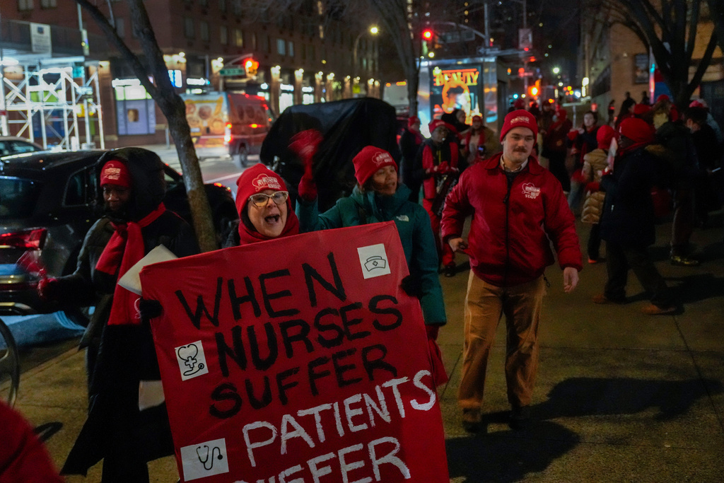 Nurses strike outside Mount Sinai West Hospital, Monday, Jan. 12, 2026, in New York. (AP Photo/Yuki Iwamura)