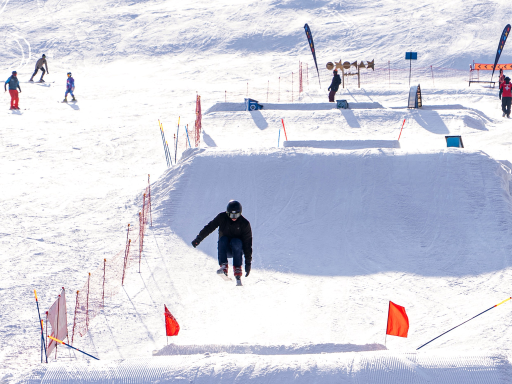 A skier descends through the snow at Afriski Mountain Resort in Maluti, Lesotho, Saturday, July 11, 2026. (AP Photo/Kayleen Morgan)