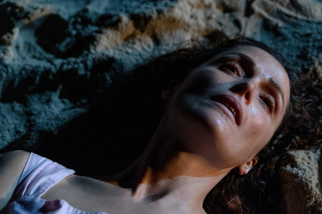 This image released by A24 shows Rose Byrne in a scene from " If I Had Legs I'd Kick You." (Logan White/A24 via AP)