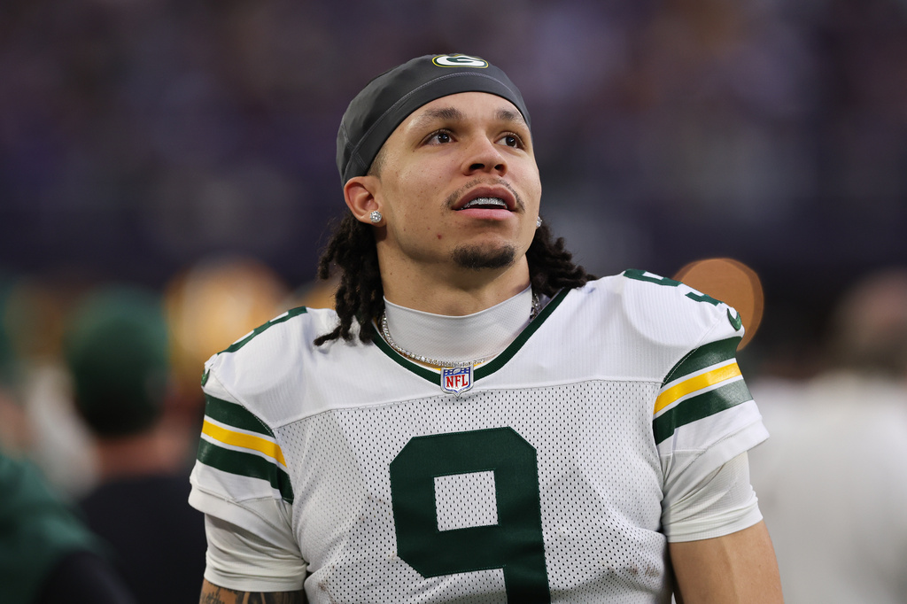 FILE - Green Bay Packers wide receiver Christian Watson looks on during the first half of an NFL football game against the Minnesota Vikings, Jan. 4, 2026 in Minneapolis. (AP Photo/Stacy Bengs, File)
