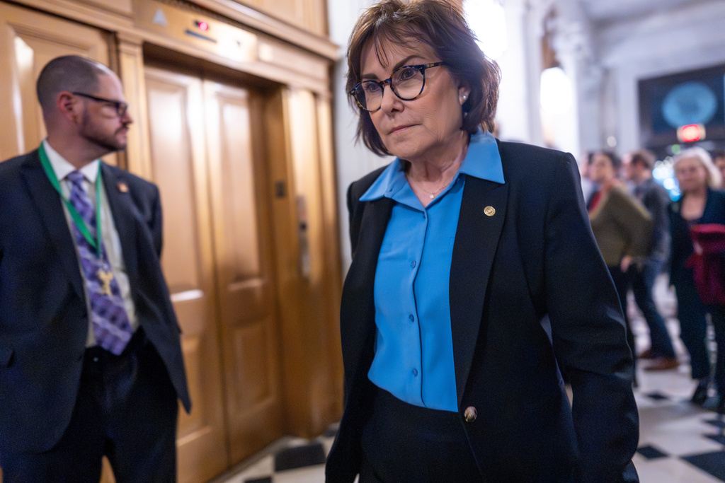 Sen. Jacky Rosen, D-Nev., arrives at the chamber as the Senate works to bring the longest government shutdown in U.S. history to an end after a bipartisan compromise, at the Capitol in Washington, Monday, Nov. 10, 2025. (AP Photo/J. Scott Applewhite)