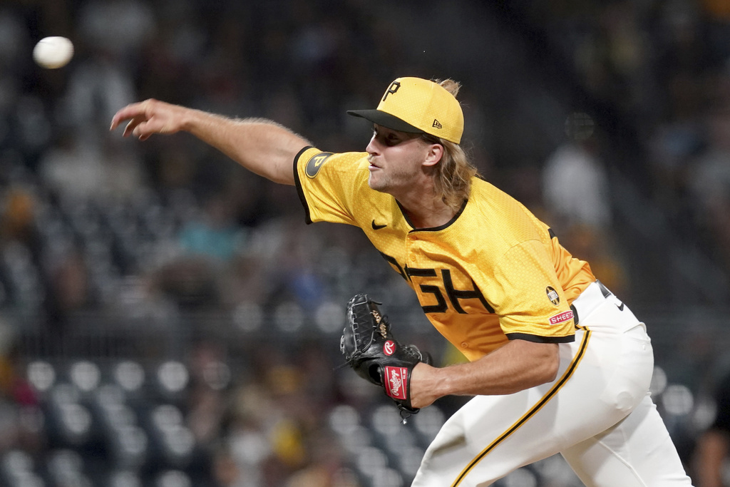 Pittsburgh Pirates pitcher Carmen Mlodzinski delivers during the sixth inning of a baseball game against the Milwaukee Brewers, Friday, Sept. 5, 2025, in Pittsburgh. (AP Photo/Matt Freed)