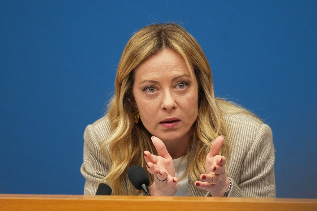 Italian Prime Minister Giorgia Meloni holds her annual start-of-the-year press conference in the press room at the Lower Chamber, in Rome, Friday, Jan. 9, 2026. (AP Photo/Andrew Medichini)
