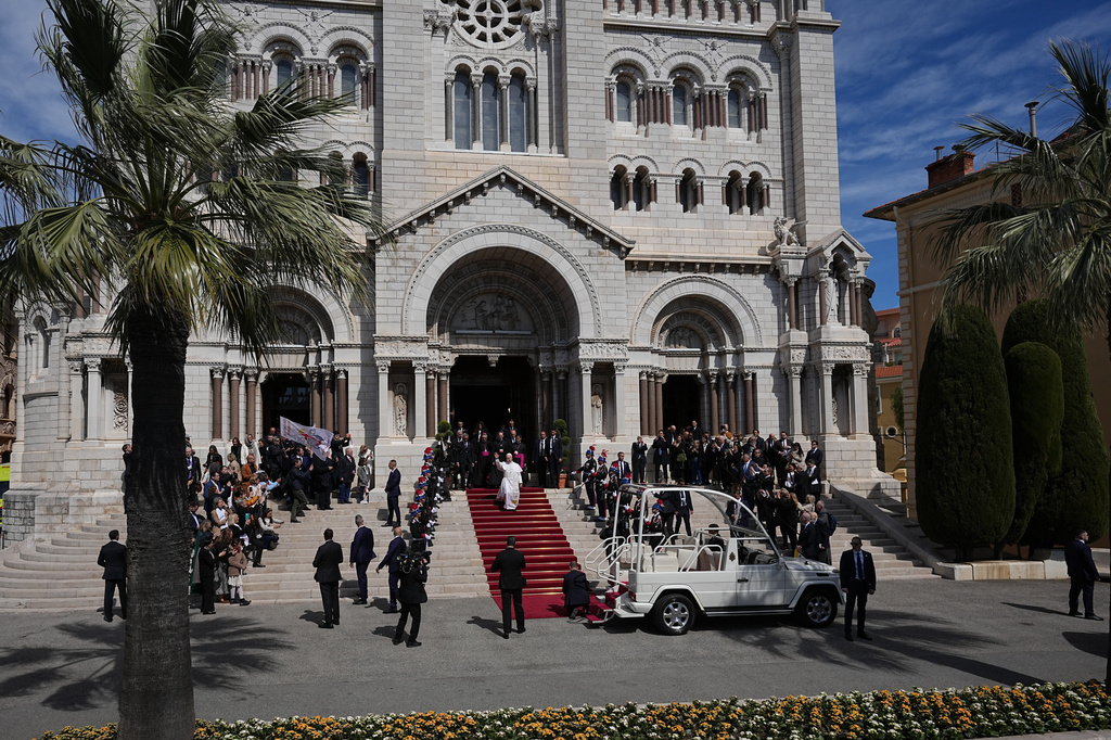 Pope Leo XIV leaves after meeting with the local Catholic community inside Monaco Cathedral in Monaco-Ville, Monaco, Saturday, March 28, 2026. (AP Photo/Laurent Cipriani)