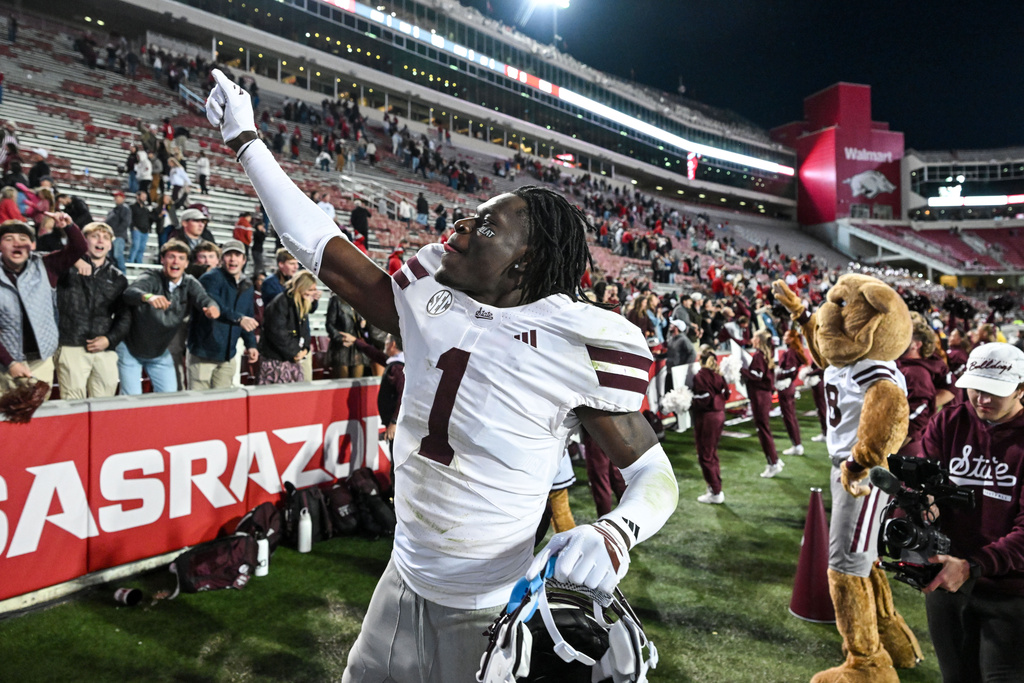 Mississippi State defensive back Kelley Jones (1) celebrates after defeating Arkansas 38-25 during an NCAA college football game Saturday, Nov. 1, 2025, in Fayetteville, Ark. (AP Photo/Michael Woods)