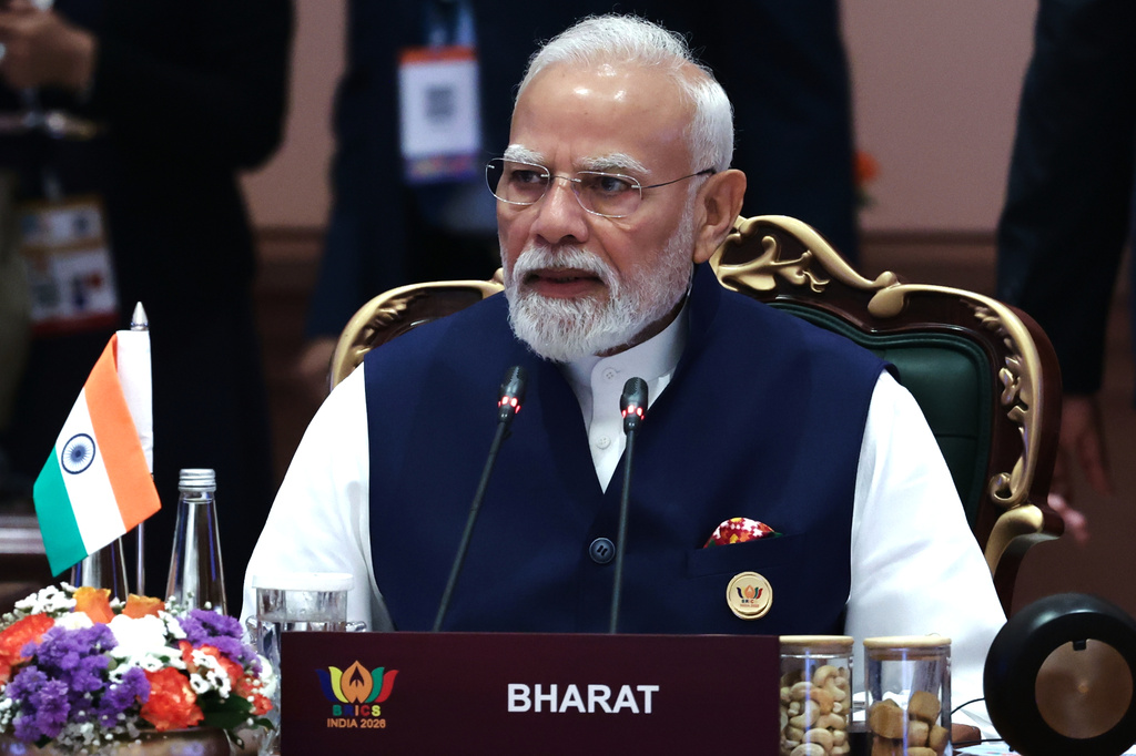Indian Prime Minister Narendra Modi attends a session of the BRICS Plus Outreach format in New Delhi, India, on Sunday, Sept. 13, 2026. (Alexander Kazakov, Sputnik, Kremlin Pool Photo via AP)