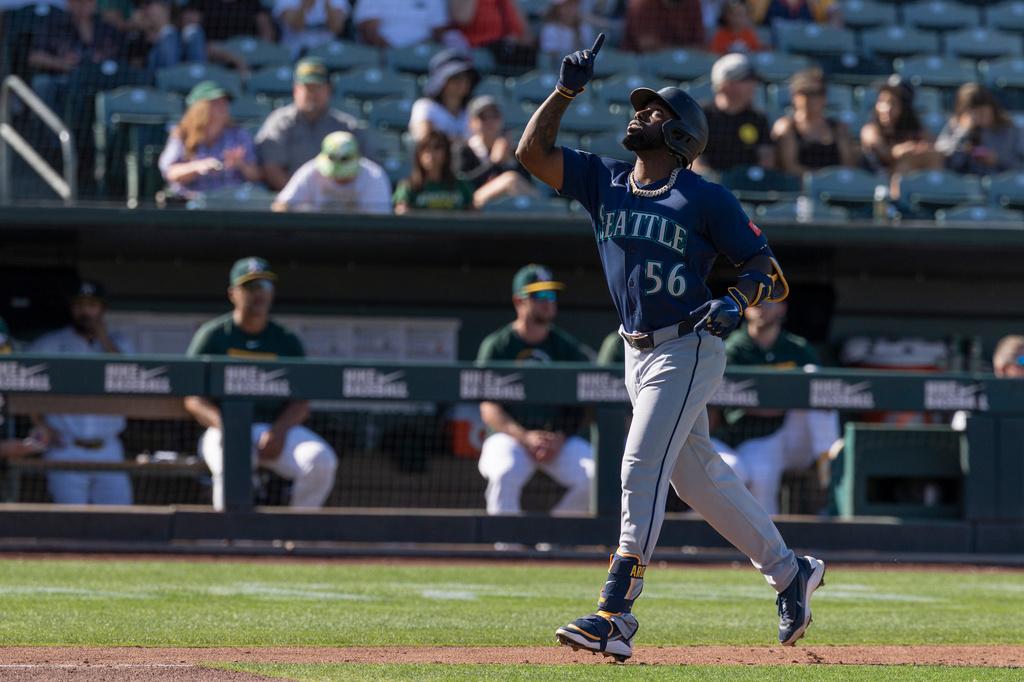 Seattle Mariners' Randy Arozarena runs the bases after hitting a home run during the eighth inning of a baseball game against the Athletics, Sunday, Sept. 13, 2026, in West Sacramento, Calif. (AP Photo/Sara Nevis)