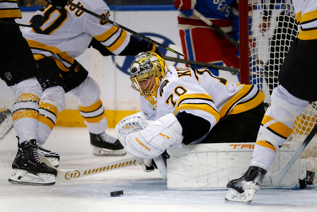 Boston Bruins goalie Joonas Korpisalo (70) prepares to cover the puck during the first period of an NHL hockey game against the New York Rangers Monday, Jan. 26, 2026, in New York. (AP Photo/John Munson)