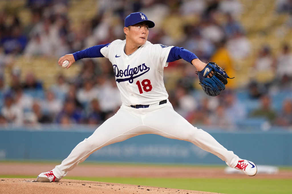 Los Angeles Dodgers pitcher Yoshinobu Yamamoto throws to the plate during the first inning of a baseball game against the Cincinnati Reds, Wednesday, Sept. 9, 2026, in Los Angeles. (AP Photo/Mark J. Terrill)