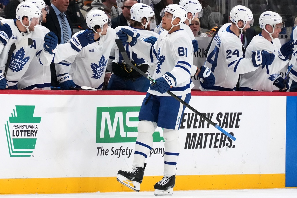 Toronto Maple Leafs' Dakota Joshua (81) returns to the bench after scoring during the second period of an NHL hockey game against the Pittsburgh Penguins in Pittsburgh, Saturday, Nov. 29, 2025. (AP Photo/Gene J. Puskar)