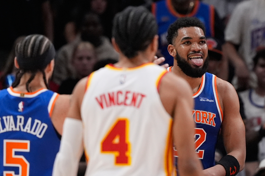 New York Knicks center Karl-Anthony Towns (32) celebrates scoring in the first half during Game 6 in a first-round NBA basketball playoffs series against the Atlanta Hawks Thursday, April 30, 2026, in Atlanta. (AP Photo/Brynn Anderson)