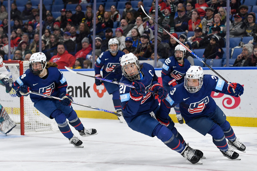 United States players skate out of the offensive zone during the first period of a Rivalry Series women's hockey game against Canada, Saturday, Nov. 8, 2025, in Buffalo, N.Y. (AP Photo/Adrian Kraus)