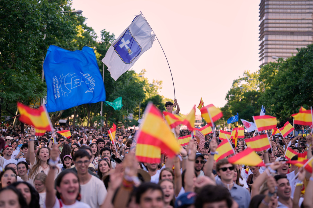 People wait for the arrival of Pope Leo XIV during a prayer vigil with young people at Plaza de Lima in Madrid, Spain, Saturday, June 6, 2026, on the first day of his seven-day apostolic visit to mainland Spain and the Canary Islands. (AP Photo/Bernat Armangue)