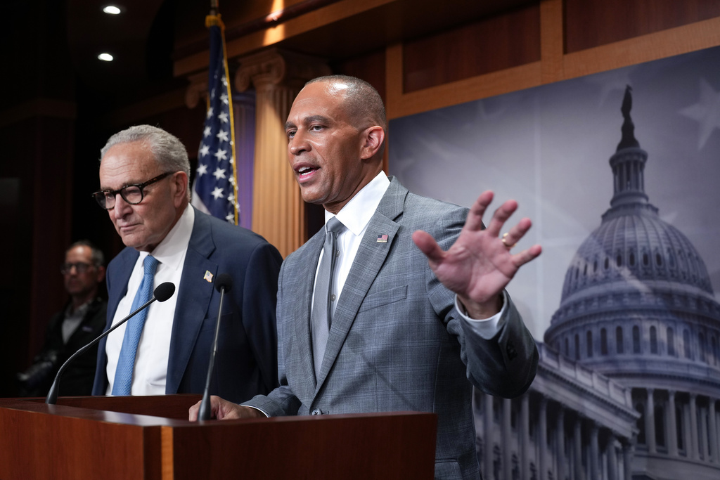Senate Minority Leader Chuck Schumer, D-N.Y., and House Minority Leader Hakeem Jeffries, D-N.Y., right, talk with reporters following their meeting with President Donald Trump and Republican leaders on the government funding crisis, at the Capitol in Washington, Monday, Sept. 29, 2025. (AP Photo/J. Scott Applewhite)