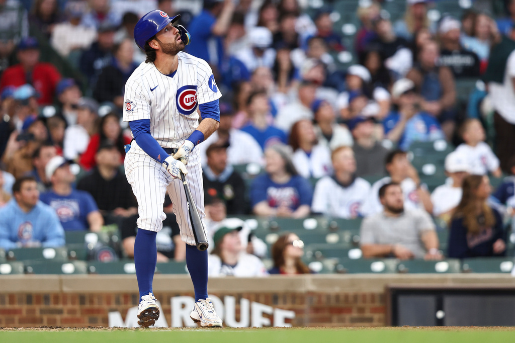 Chicago Cubs' Dansby Swanson watches his home run during the second inning of a baseball game against the Colorado Rockies in Chicago, Wednesday, June 17, 2026. (AP Photo/Jessie Alcheh)