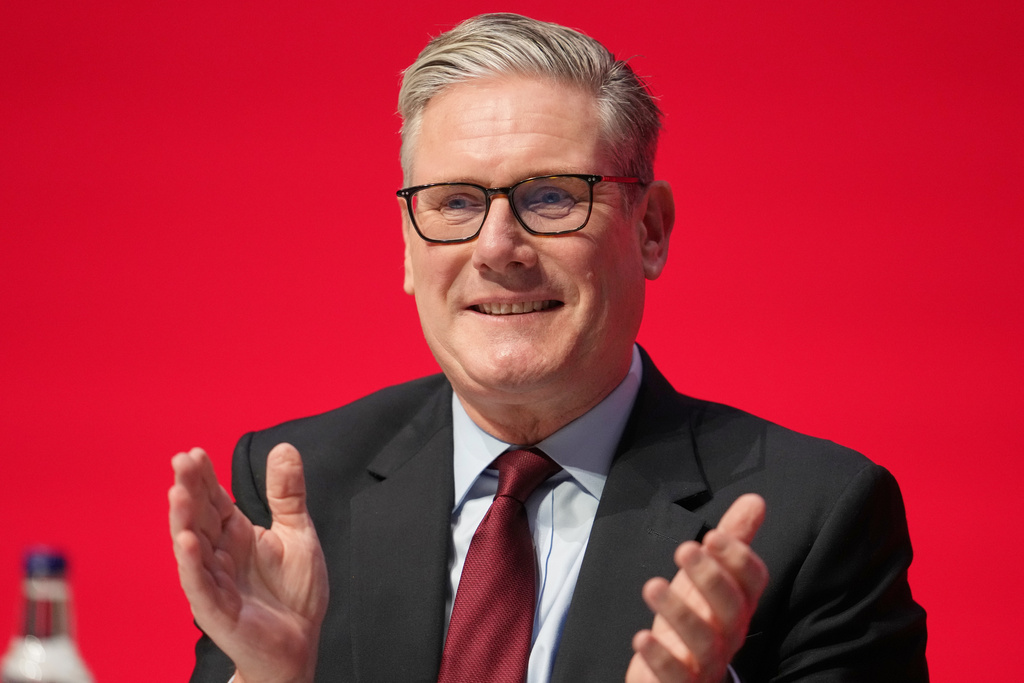 Britain's prime Minister Keir Starmer applauds as he listens to his Chancellor of the Exchequer Rachel Reeves give her keynote speech during the annual Labour Party conference in Liverpool, England, Monday, Sept. 29, 2025. (AP Photo/Jon Super)