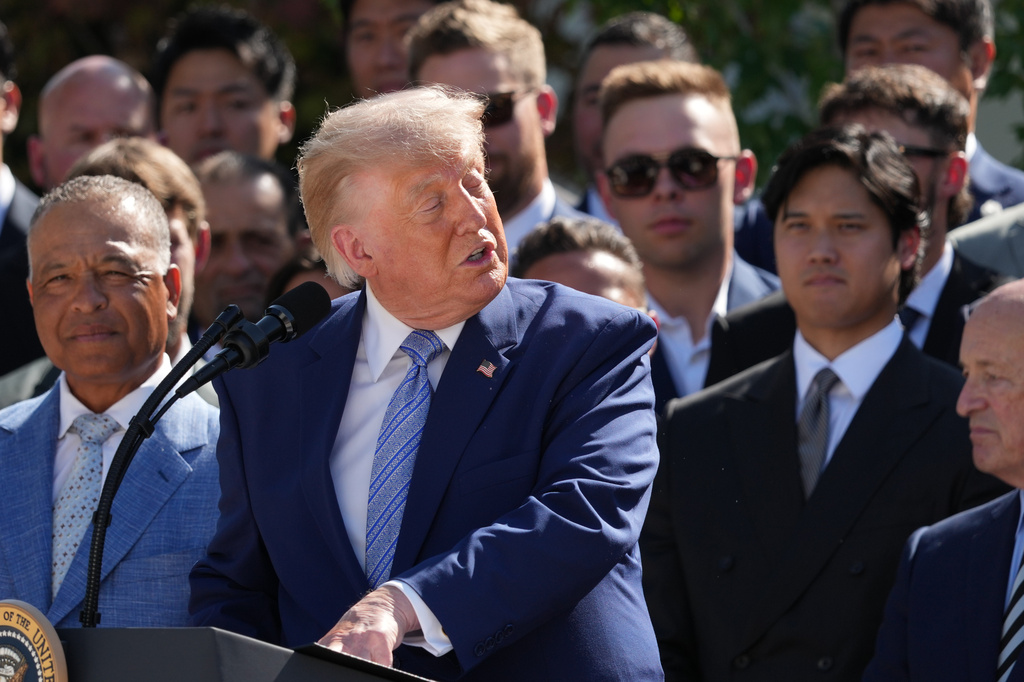 President Donald Trump speaks during an event to honor the 2025 World Series champions Los Angeles Dodgers in the Rose Garden of the White House, Thursday, July 23, 2026, in Washington, as Los Angeles Dodgers Shohei Ohtani watches. (AP Photo/Alex Brandon)